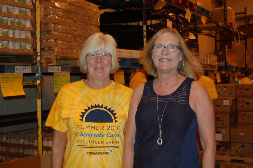 Chesapeake Utilities partnered with the Maryland Food Bank for its Summer Cares Event. Left to right, are Ellen Davies and Sydney Davis, External Communications Manager.