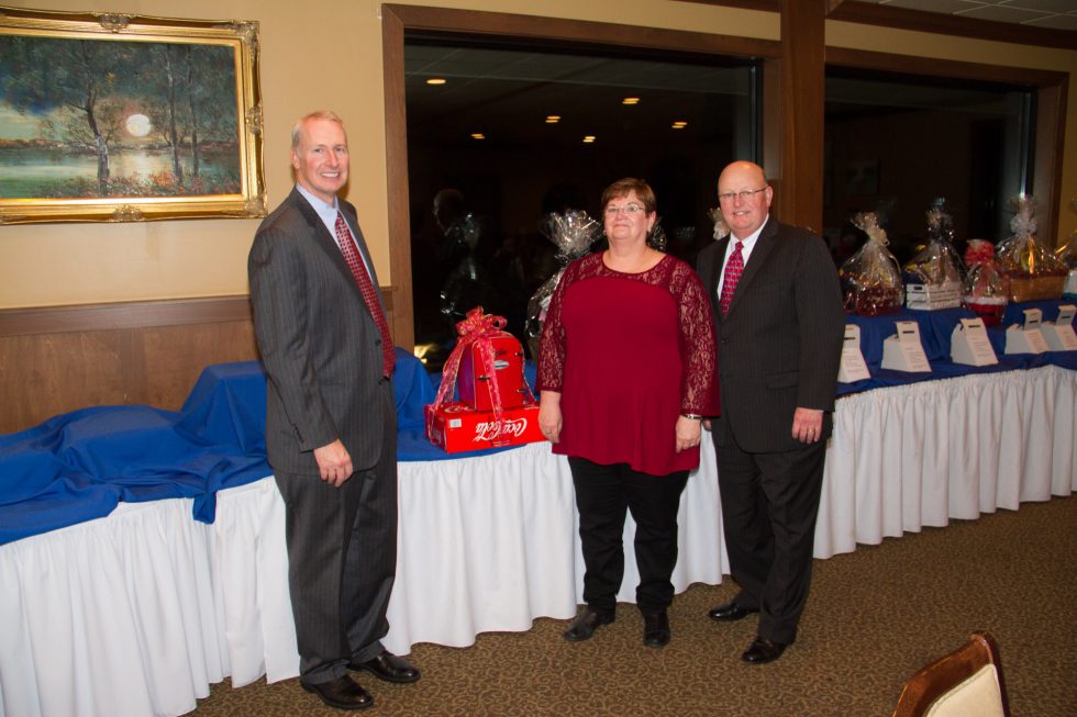 Pictured, left to right, is Doug Ward, Vice President of Aspire Energy; Debbie Bonner, Senior Land Clerk; and Mike McMasters, President and CEO, at Aspire Energy’s 2017 Holiday Celebration.