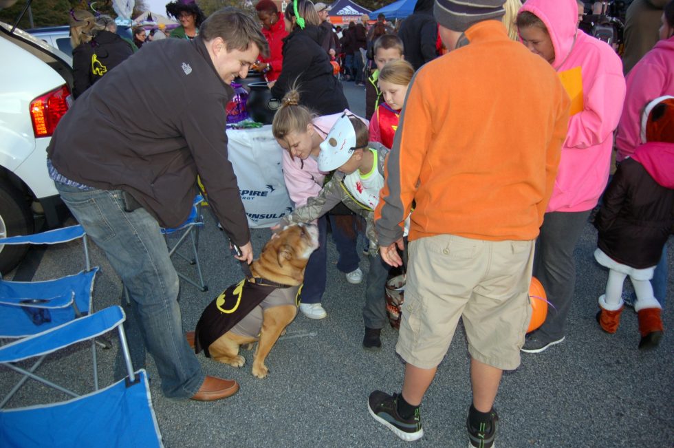 The children enjoyed the candy as well as meeting Duke, canine pal of Brent Porter, Manager of Brand Communications. 