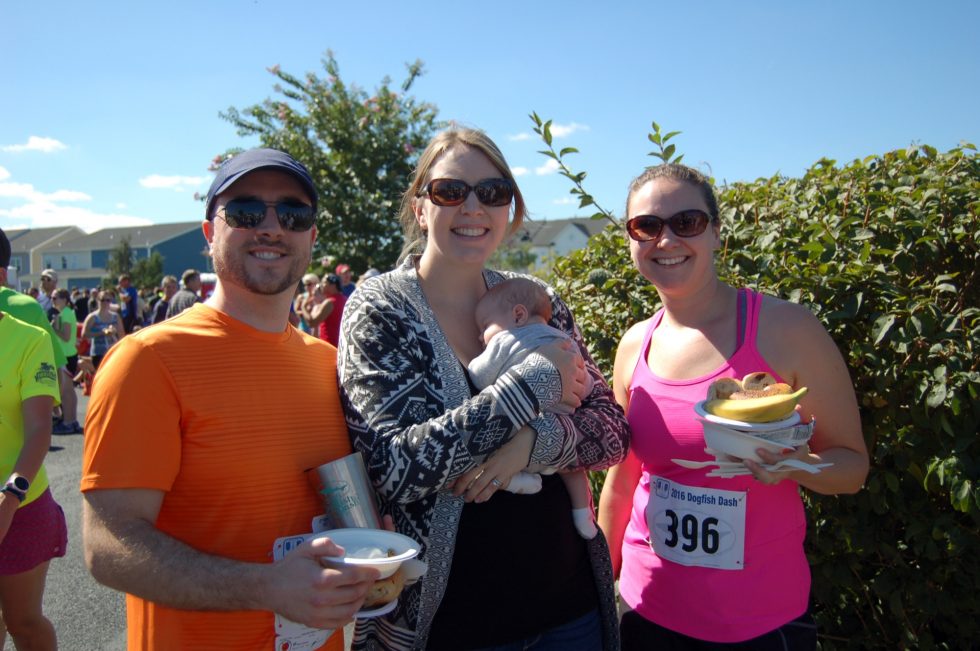 Left to right, are Solomon McCloskey, Senior Manager, Gas Pipeline Operations, and runner in the 8K competition; and Lindsey, spouse of Solomon, with their three-week-old daughter Lillian and friend Kellie.