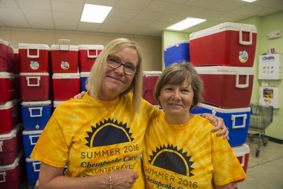 Summer Cares Volunteer Event organizers, left to right, are Sydney Davis, External Communications Manager; and Suzy Hutchison, Customer Experience Manager.