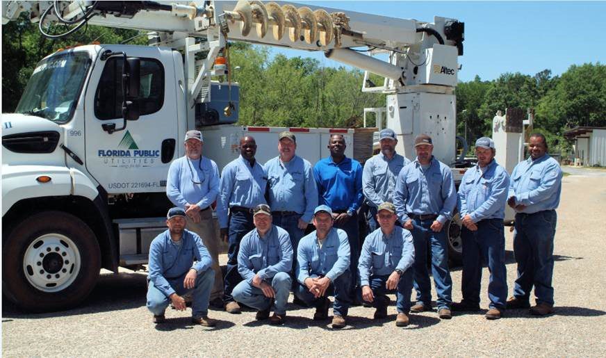 Pictured are our team of linemen from our Marianna, FL office. Back row, left to right, are Andy Bevis, Senior Lineman; Darryl Grooms, Crew Leader; Alvin Foran, Crew Leader; Rhondon Gray, Safety Coordinator II - Electric; Bradley Flowers, Senior Lineman; James Ussery, Crew Leader; Eric Norris, Lineman; and Chris Allen, Apprentice Lineman. Front row, left to right, are Stephen Amos, Apprentice Lineman; Kevin Harris, Senior Lineman; Bobby See, IMC Technician I; and John Griffin, IMC Technician I.
