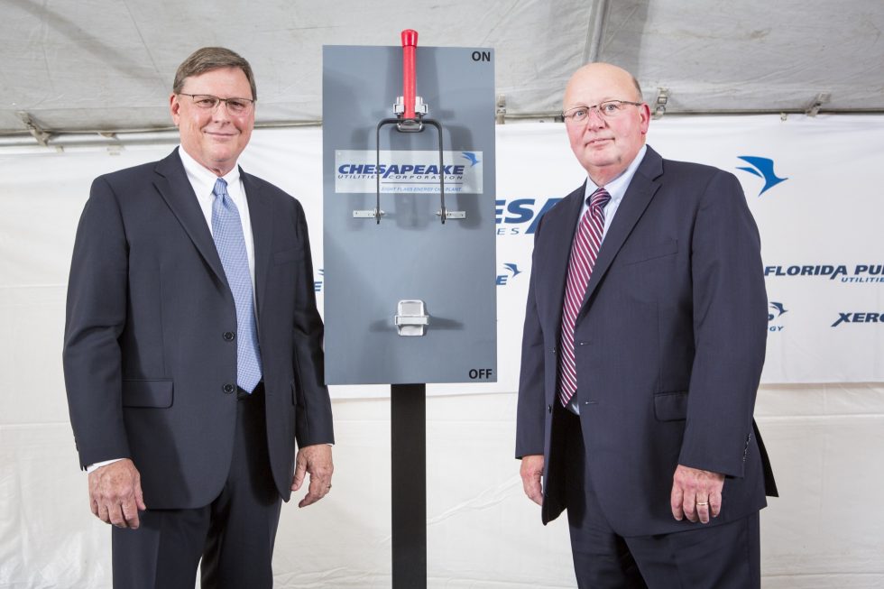 Left to right, are Jeff Householder, President of FPU; and Mike McMasters, President and CEO, who commemorated the start up of the Eight Flags Energy CHP Plant by flipping a ceremonial switch.
