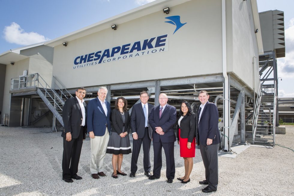 Outside of the CHP Plant are, left to right, Vikrant Gadgil, Vice President and Chief Information Officer; Jim Moriarty, Senior Vice President and General Counsel; Beth Cooper, Senior Vice President and CFO; Jeff Householder, President of FPU; Mike McMasters, President and CEO; Elaine Bittner, Senior Vice President of Strategic Development; and Steve Thompson, Senior Vice President.